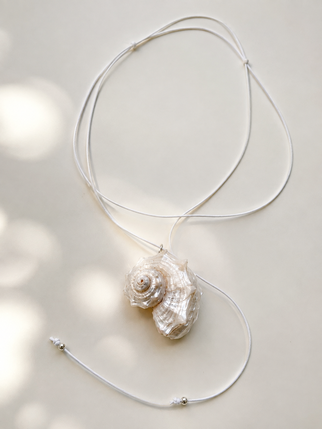 Cassis shell wrap necklace