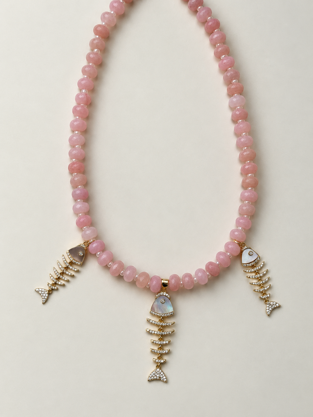 Studio Marea Isola Rosa Necklace – Pink Rondelle Bead & Fishbone Charm Necklace, Handmade