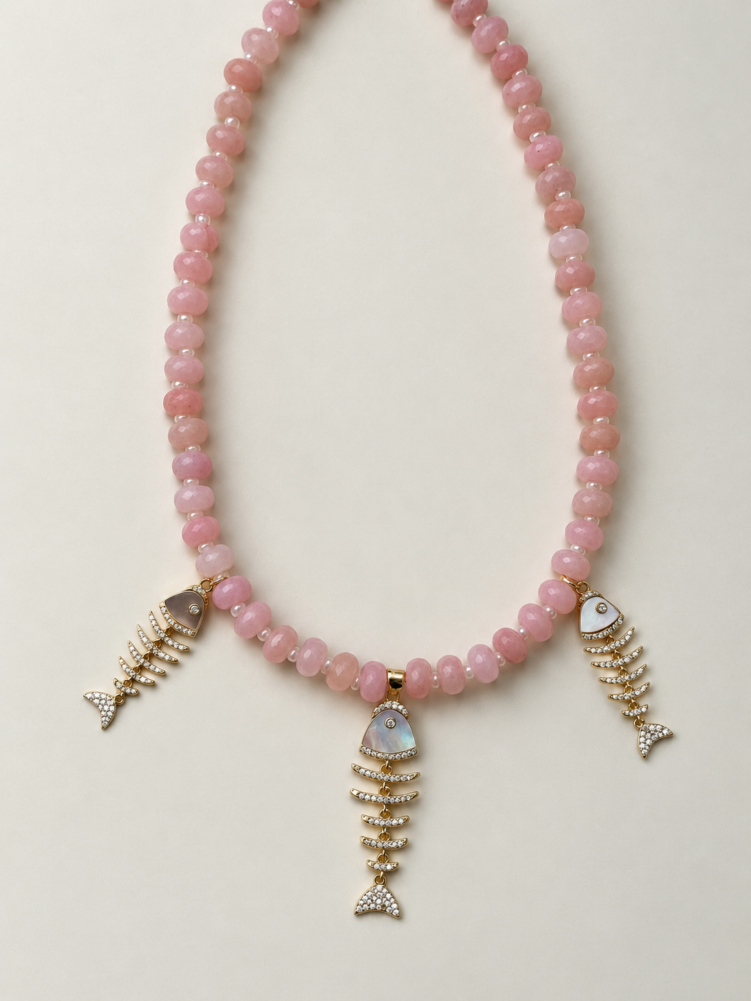 Studio Marea Isola Rosa Necklace – Pink Rondelle Bead & Fishbone Charm Necklace, Handmade