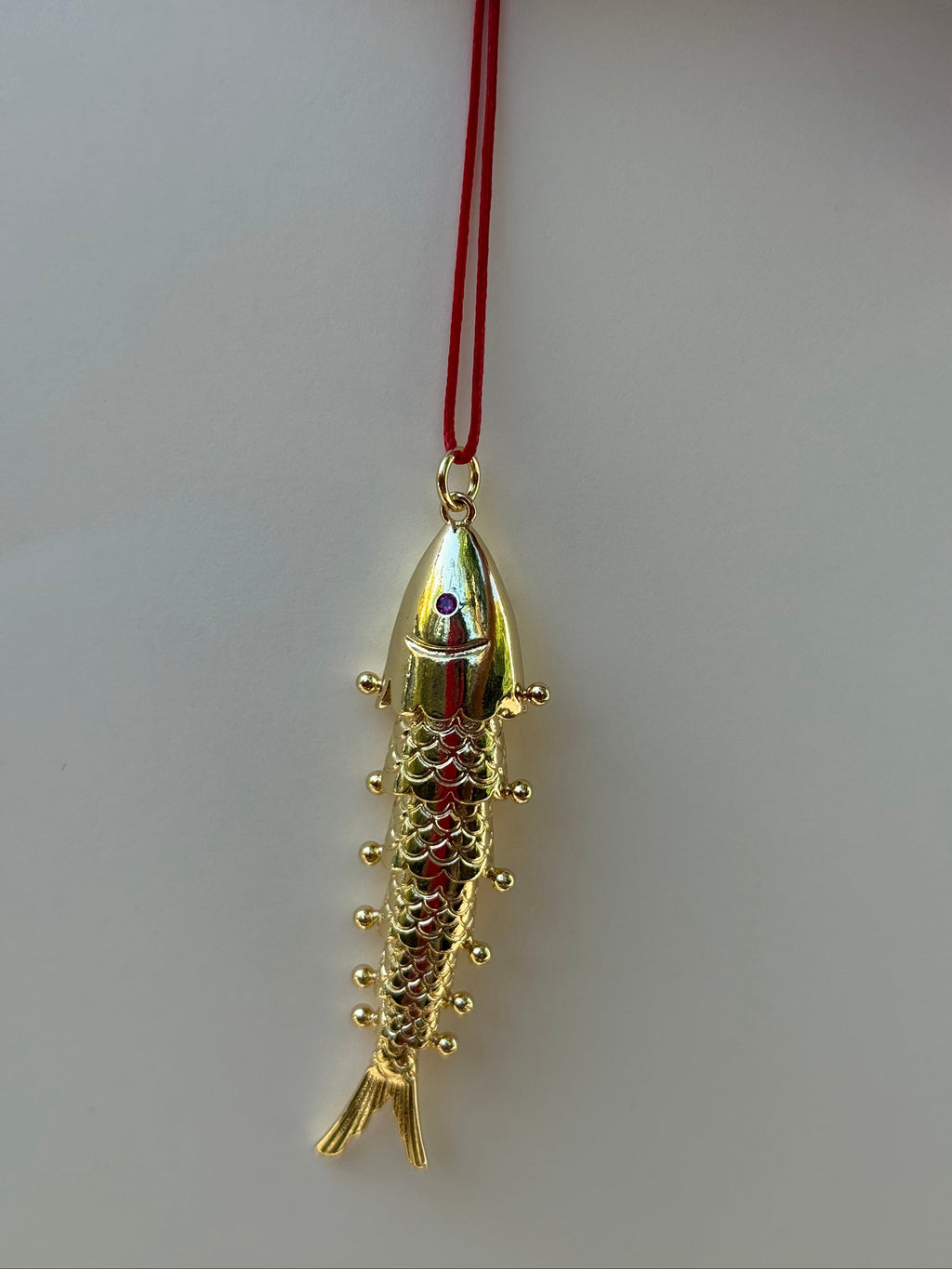 Studio Marea Bali Fish Necklace – Gold Articulated Fish Pendant on Red Cord, Handmade, Adjustable
